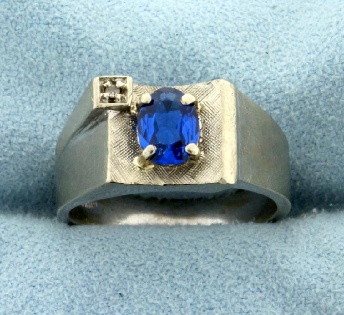 1ct Blue Spinel and Diamond Ring in 10K White Gold: In 10K White Gold. Contains a natural 7x5mm oval cut Spinel gemstone with bright blue color and excellent clarity. Also contains a high quality .01ct Diamond. Size 8. 5.0g