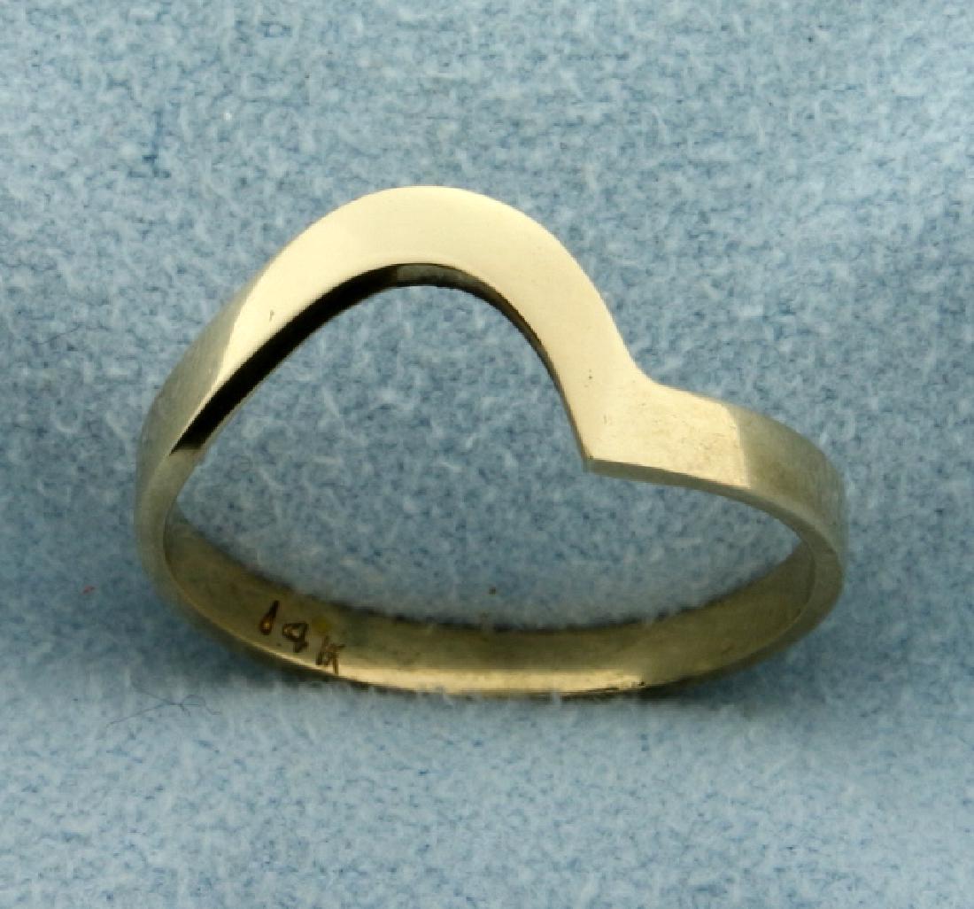 Abstract Modern Design Stacking Ring in 14k Yellow Gold: In 14k yellow gold. Band is approximately 2.5mm wide in front. Tapers to 2.2mm in back. Size 6 3/4. 1.6g.