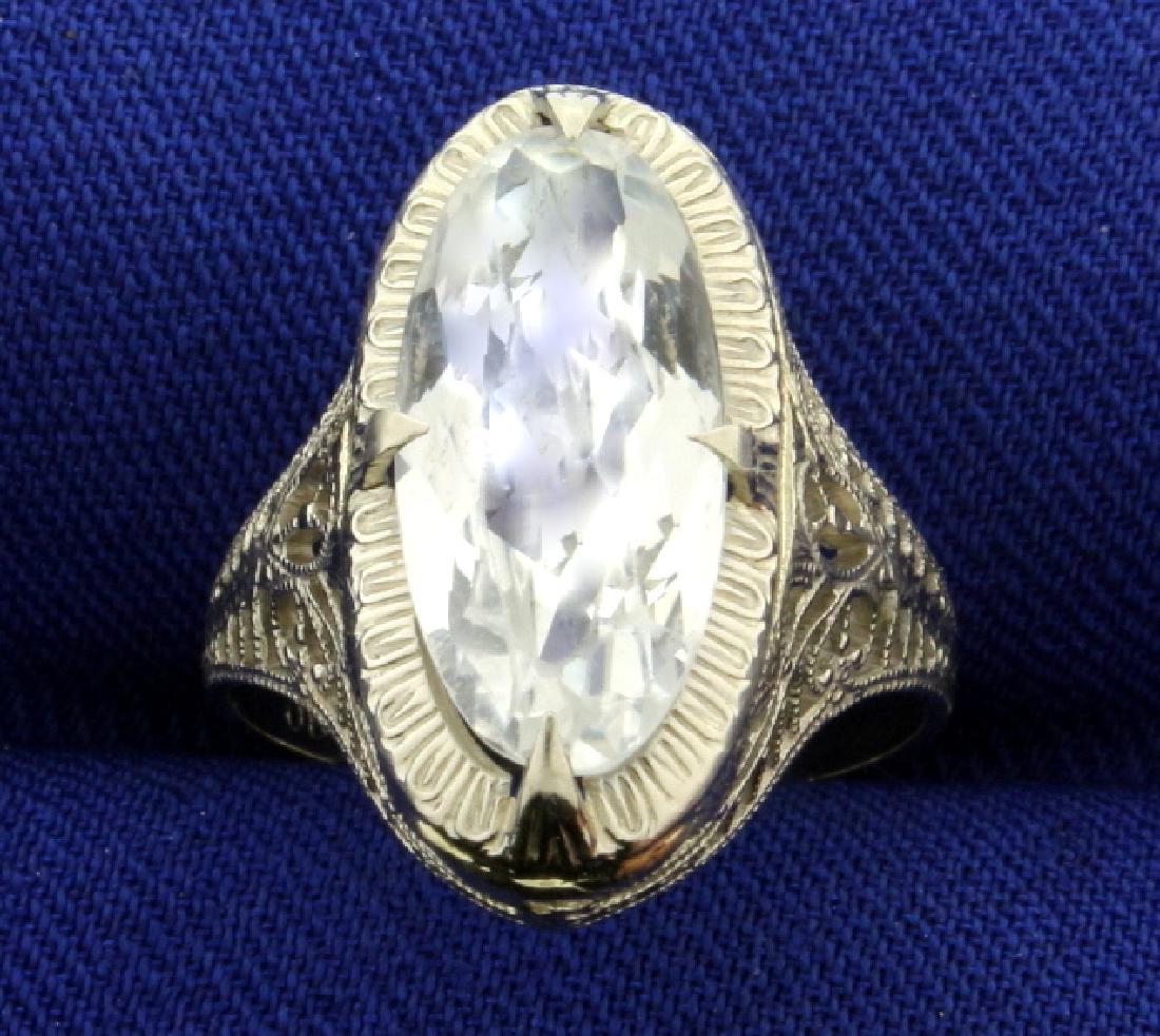 Filigree Antique Style CZ Ring in 14k White Gold: In 14k white gold. Contains 15x7mm CZ gemstone with bright "white" color and lots of sparkle. Intricate filigree design on shank. Size 5 1/2. 2.8g.