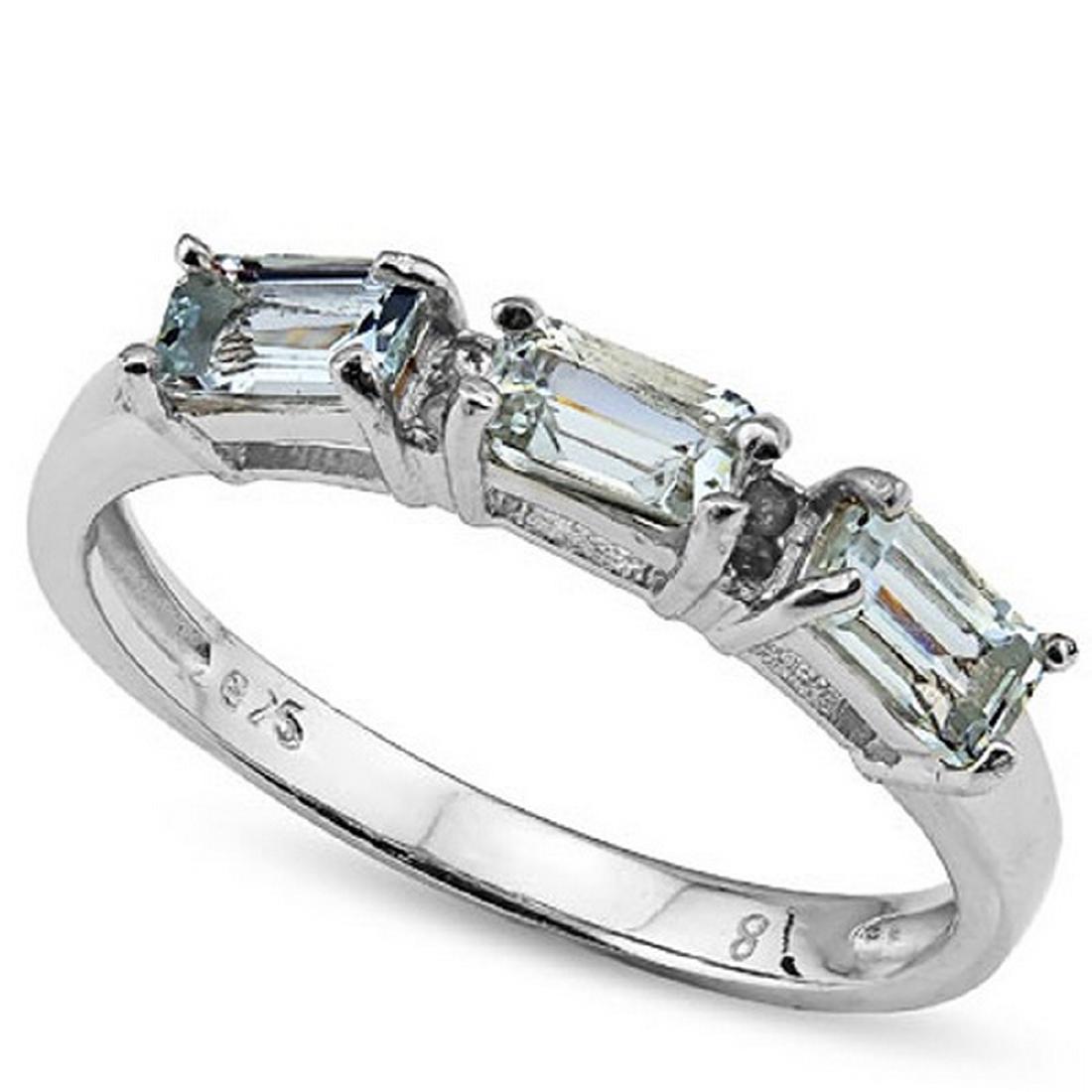 Aquamarine and Diamond Stacking Ring in Sterling Silver: Awesome 3/4 CTW genuine Aquamarine emerald cut gemstones are set with 0.02 CTW genuine diamond accents in Platinum over sterling silver for added brilliance. Size 7. 1.5g