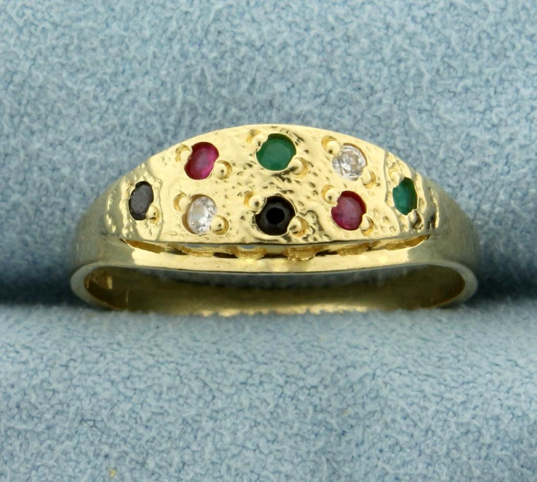 Sapphire, Emerald, Ruby, Diamond, and Onyx Ring in 14K: In 14K Yellow Gold. Contains two 1.6mm natural Onyx, Emerald, White Sapphire, and Ruby gemstones. Size 9. 2.9g