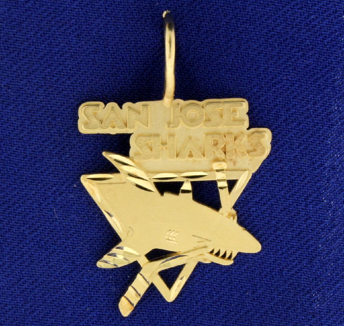 San Jose Sharks NHL Hockey Pendant: In 14k yellow gold, 1 3/8" long with bale. 2.7g.