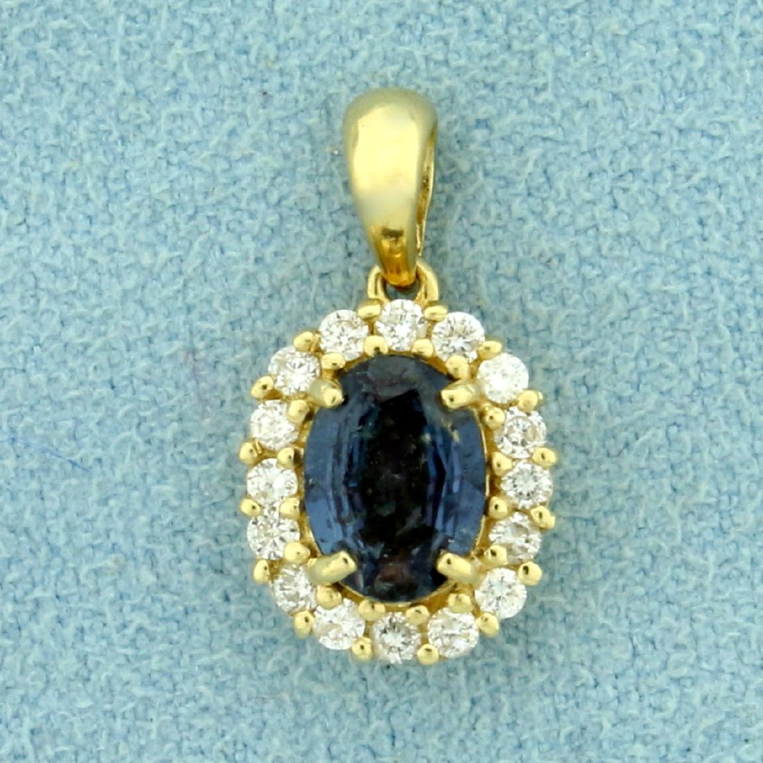 Natural 1ct Alexandrite and Diamond Pendant in 14K: In 14K Yellow Gold. Contains a high quality natural 7x5mm oval color changing Alexandrite gemstone that changes from green to red depending on light source. Also contains sixteen high quality .01ct ro