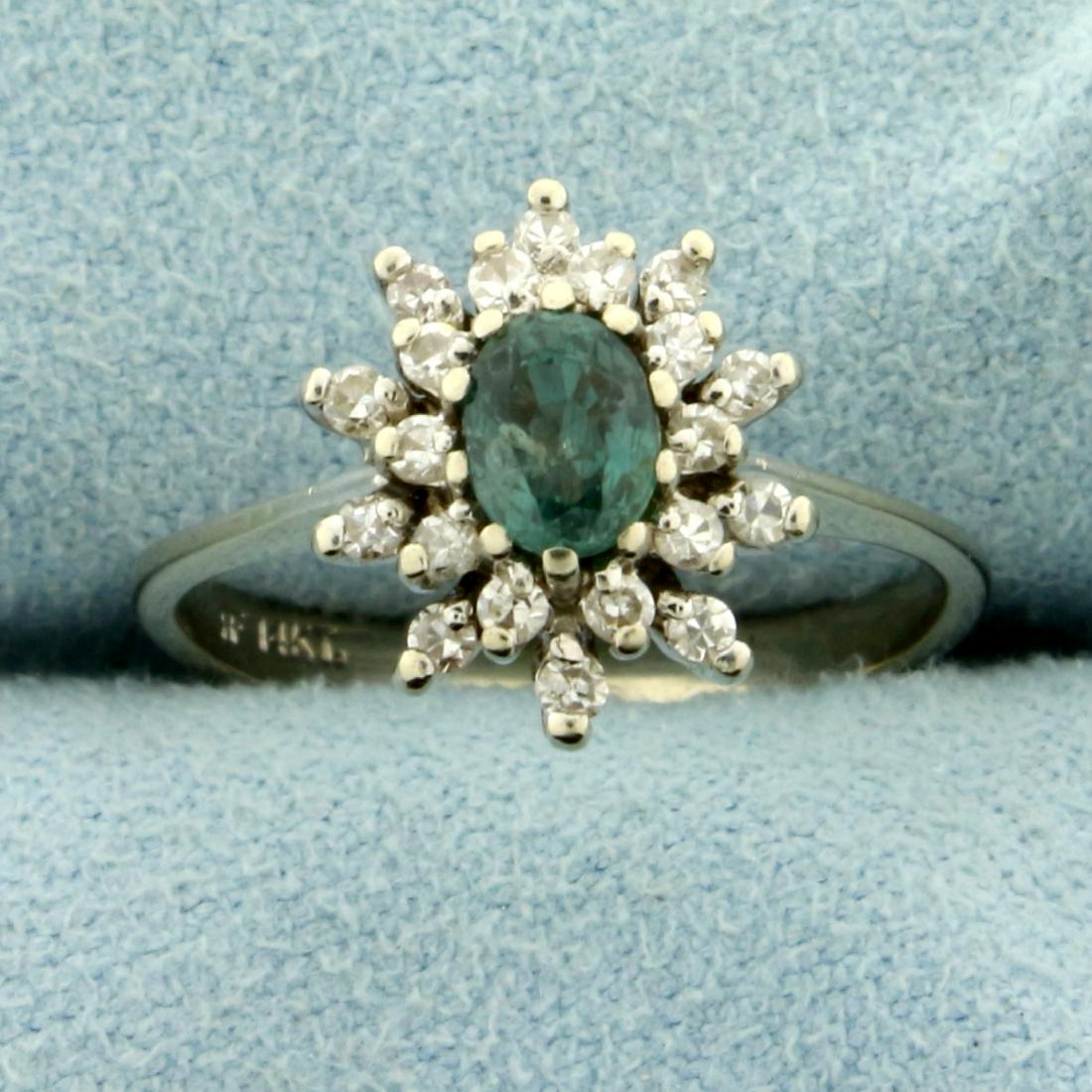 Natural Alexandrite and Diamond Starburst Ring in 14K: In 14K White Gold. Contains a natural 6x4mm oval Alexandrite gemstone that changes from green to red depending on light source. Also contains twenty high quality .01ct round Diamonds, SI clarity/G col