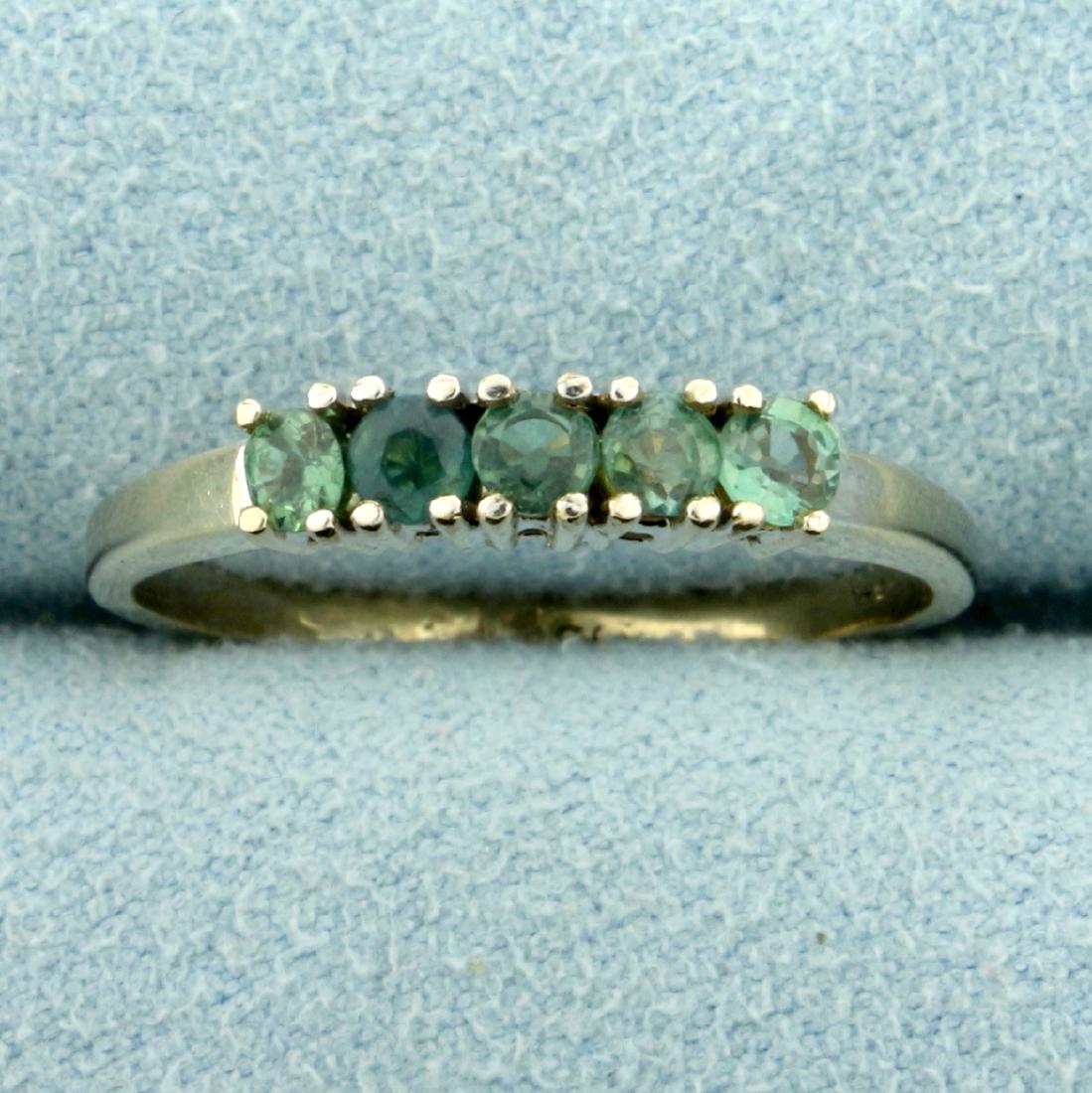 Five Stone Natural Alexandrite Ring in 14K White Gold: In 14K White Gold. Contains five natural 3mm round Alexandrite gemstones that change from green to purple depending on light source. Size 9. 2.3g