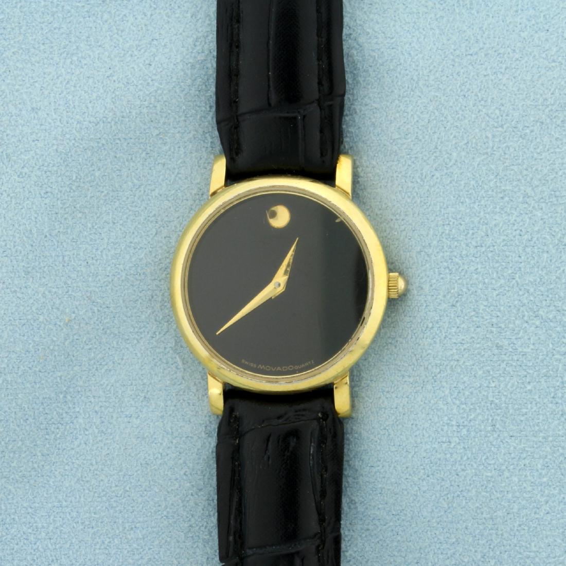 Movado Ladies Watch in Stainless Steel: In Stainless Steel. Quartz movement runs great. Some scratching on crystal and case. Leather band.