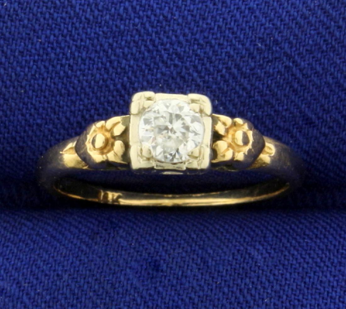 Vintage 1/3ct Solitaire Diamond Ring in 14K Yellow Gold: In 14K Yellow Gold. Contains a 1/3ct round brilliant Diamond - SI clarity/H color. Flower design on shank. Size 6 1/2. 2.2g
