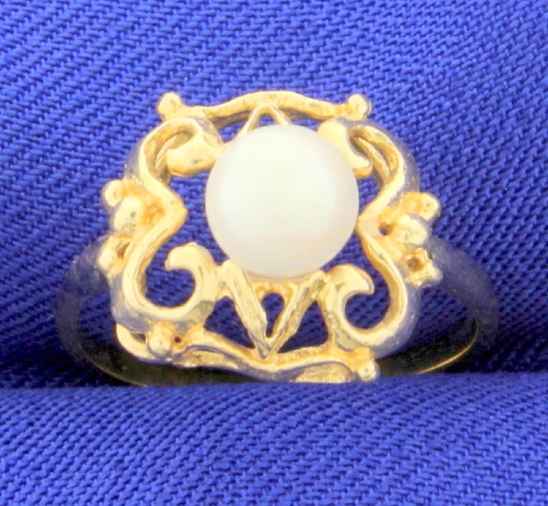 Antique Cultured Pearl Ring in 10k Yellow Gold: In 10K yellow gold, contains a 5.9mm pearl with excellent color and luster. Size 6 1/2 2.1g