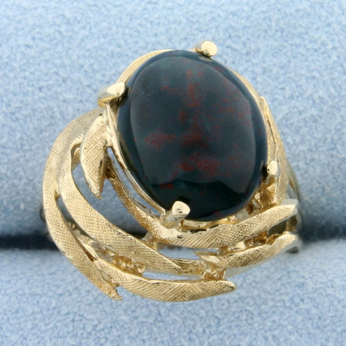 5ct Bloodstone Solitaire Ring in 14k Yellow Gold: In 14K Yellow Gold. Contains a high quality natural 12 x 10mm oval Bloodstone. Size 7. 6.4g.