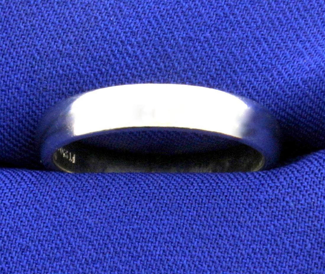 Platinum Wedding Band Ring: In Platinum. 4mm wide. 8.3g Size 9