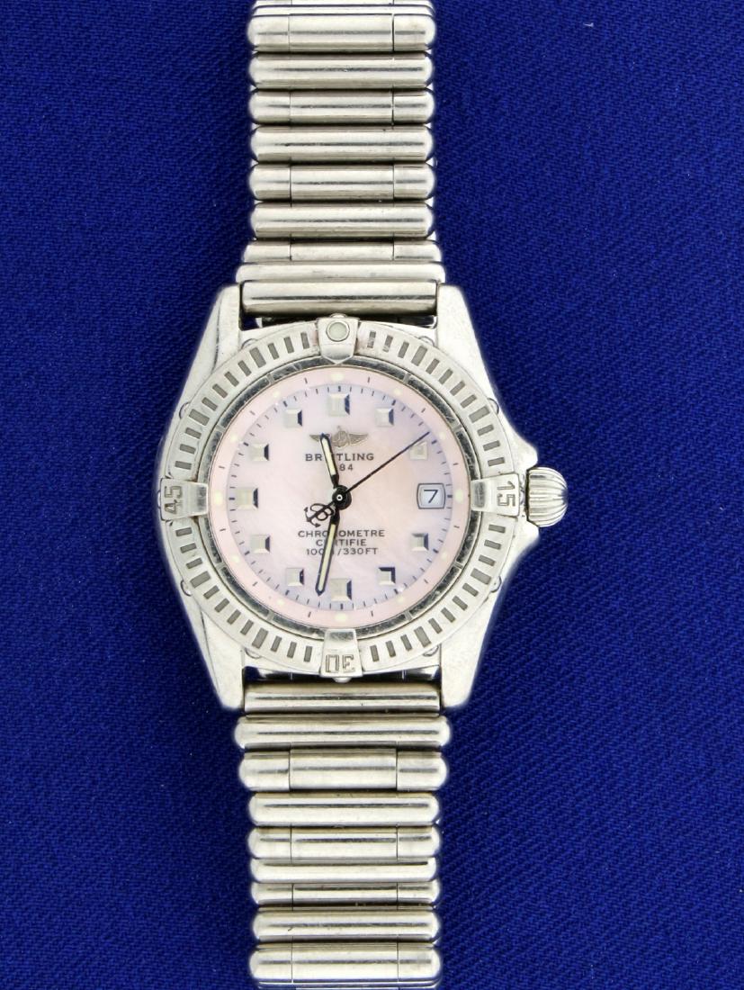 Ladies Breitling Callistino Watch Model A72345: In stainless steel. Watch is in excellent condition with no scratching on crystal and little signs of wear on case or band. Attractive Mother of Pearl Dial. Quartz movement runs perfectly with new bat