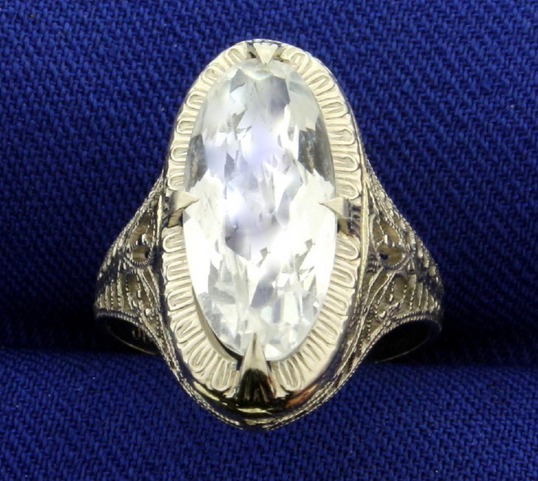 Filigree Antique Style CZ Ring in 14k White Gold: In 14k white gold. Contains 15x7mm CZ gemstone with bright "white" color and lots of sparkle. Intricate filigree design on shank. Size 5 1/2. 2.8g.