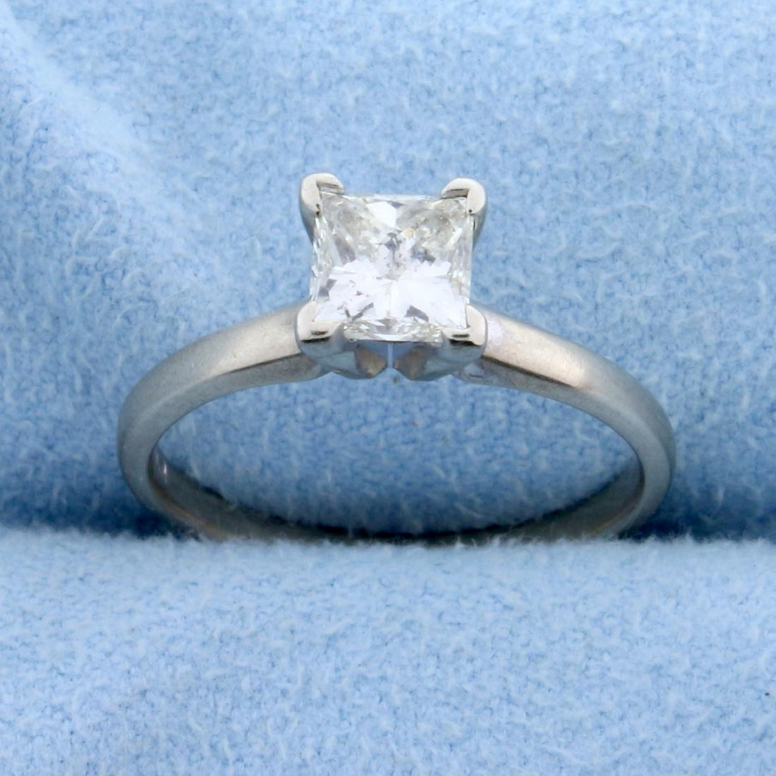 .84 Carat Princess Cut Diamond Solitaire Engagement: In 14k White Gold. The high quality princess cut natural diamond has a clarity of SI2/J color Excellent cut, lots of sparkle with excellent symmetry. Completely eye clean. Size 6. 2.3g