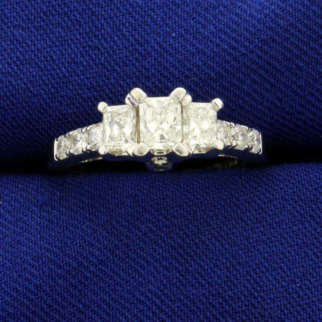 1ct TW Princess Cut Diamond Engagement Ring in 14K: In 14K White Gold. Contains three high quality princess cut diamonds - one 1/3ct and two 1/4 ct, all VS clarity/G color. Also contains two .04ct, two .03ct, two .02ct and two .01 ct diamonds of simila