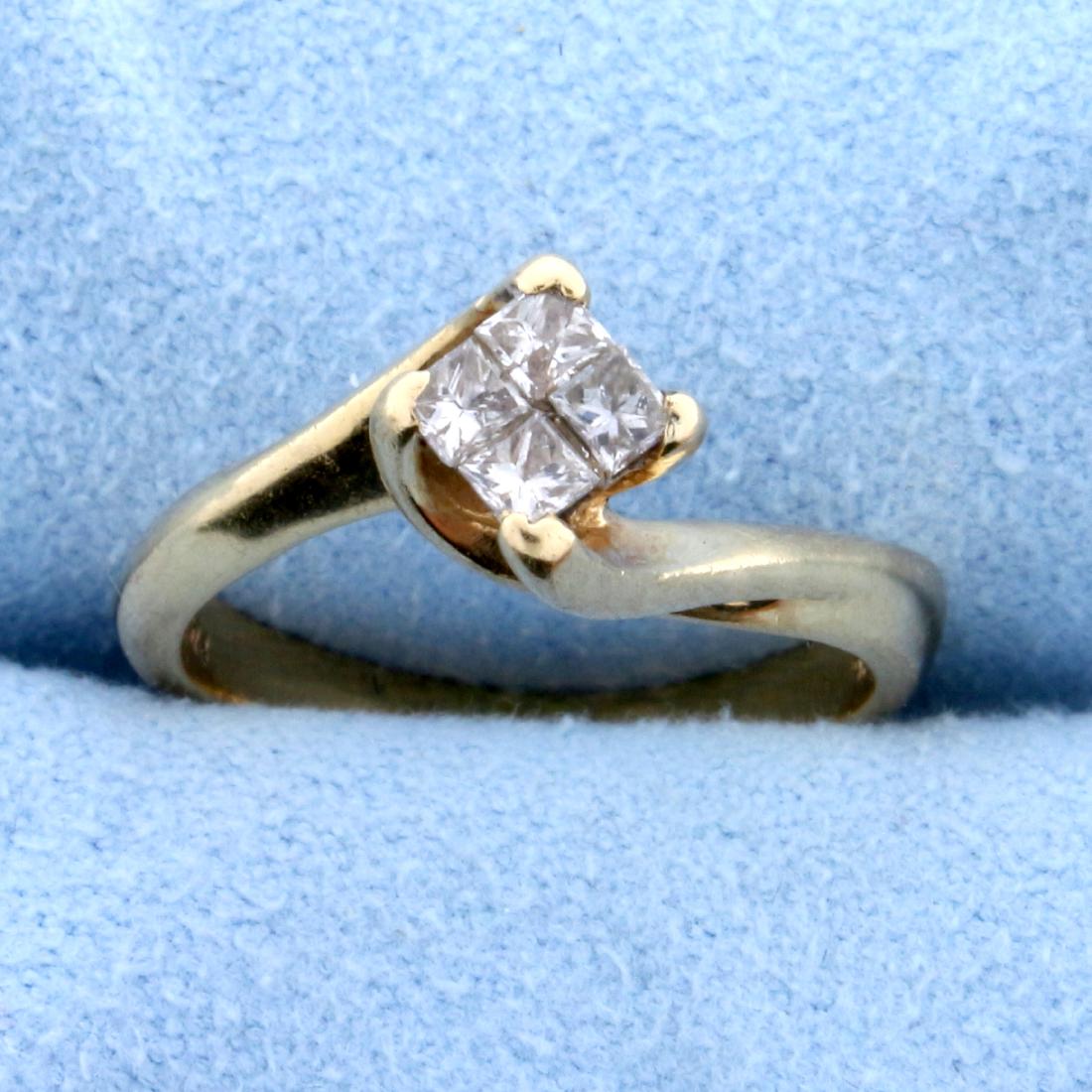 1/3ct TW Princess Cut Diamond Engagement Ring That: In 14K yellow gold it contains four 2.3mm princess cut diamonds for a total weight of 1/3ct that are invisibly set to look like one 1/2ct Solitaire diamond. Diamonds are SI clarity/I color. Size 5 1/2