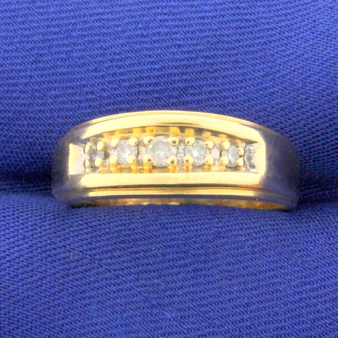 1/4ct TW Diamond Wedding or Anniversary Band Ring in: In 14K yellow gold. Contains one .09ct, two .05ct, and two .03ct high quality round brilliant diamonds - All H color/I clarity. Size 10 7.1g