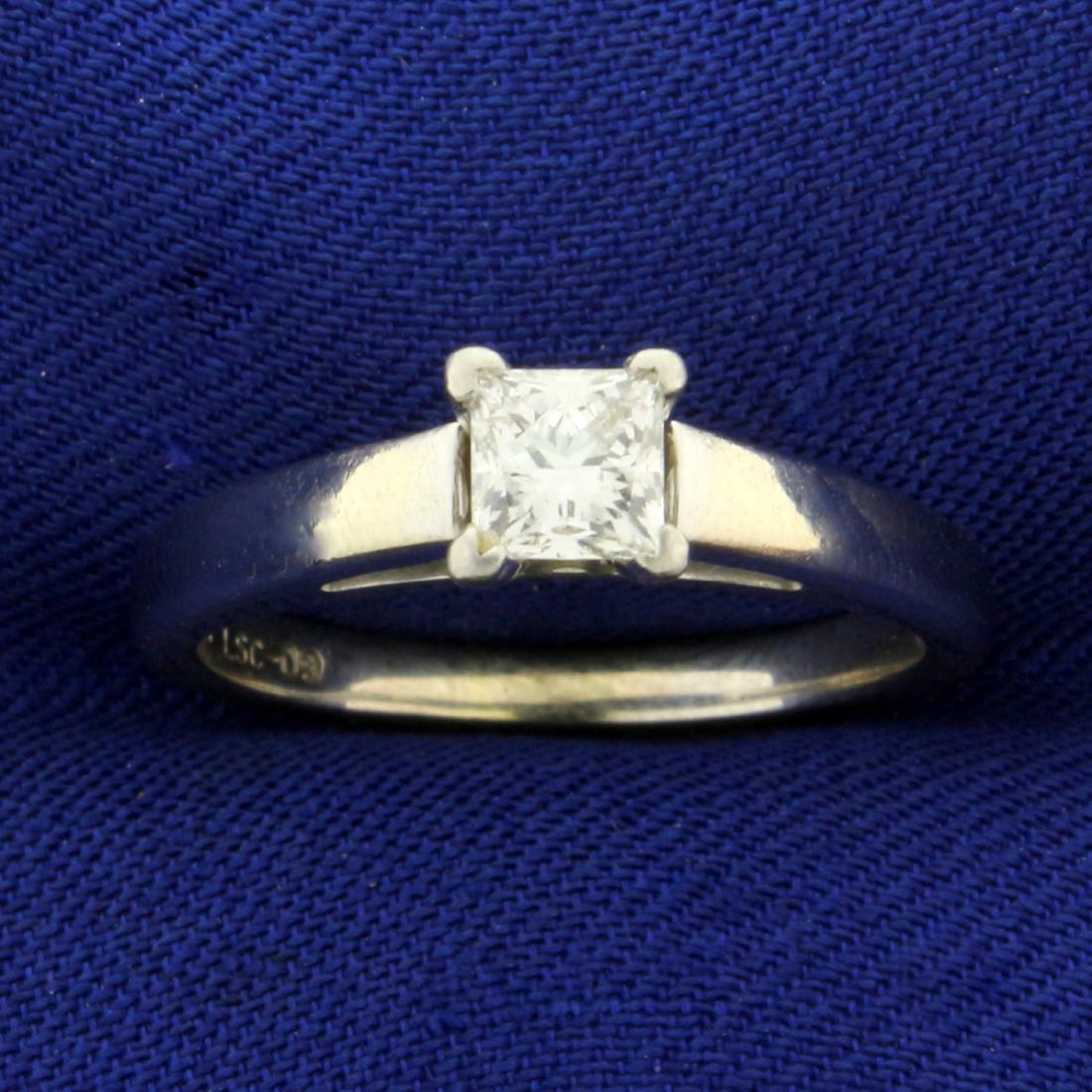 .45ct "Leo Cut" Princess Diamond Solitaire Engagement: In 14K White Gold. Contains an I.G.I. Certified "Leo" cut .45ct high quality SI2 clarity/F color Diamond. Certification present. Leo diamonds exhibit more brilliance, fire, and sparkle compared to an 