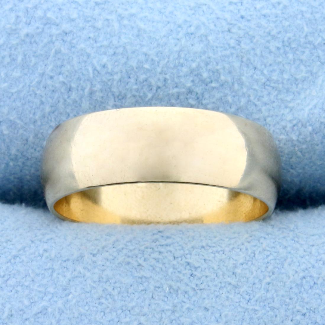 Wedding Band Ring in 14K Yellow Gold: In 14K Yellow Gold. Size 6 1/2. 6mm wide. 4.1g