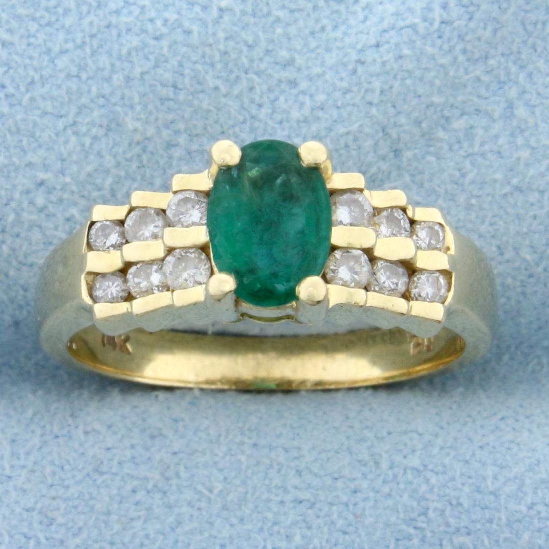 1ct Emerald and Diamond Ring in 14K Yellow Gold: In 14K Yellow Gold. Contains a high quality natural 7x5mm oval Emerald gemstone with vibrant intense green color. Also contains twelve high quality .01ct round cut Diamonds, SI clarity/I color. Size 7