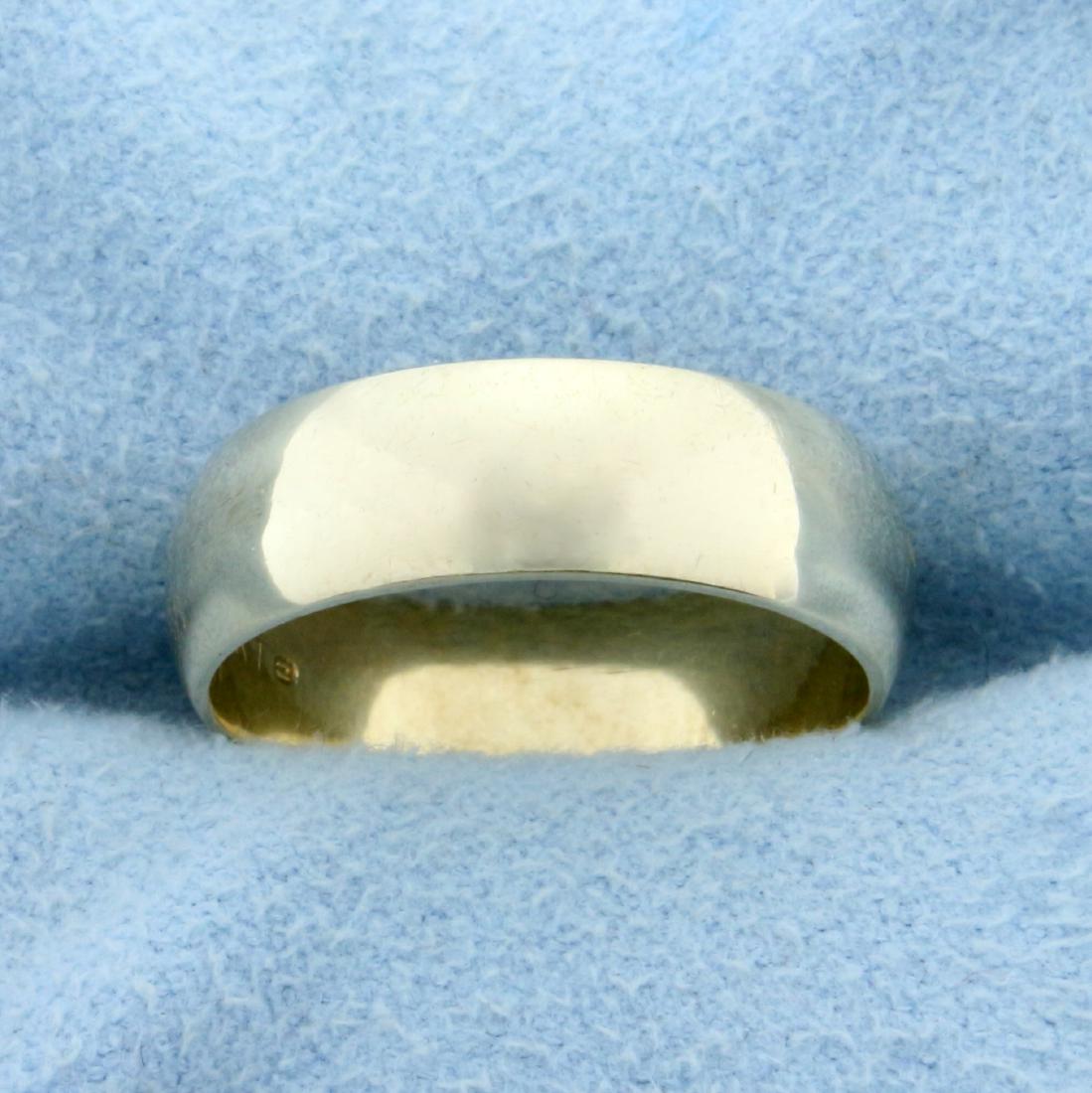 5.8mm Wide Wedding Band Ring in 10K Yellow Gold: In 10K Yellow Gold. 5.8mm wide. High polish finish. Size 6 1/2. 3.8g.