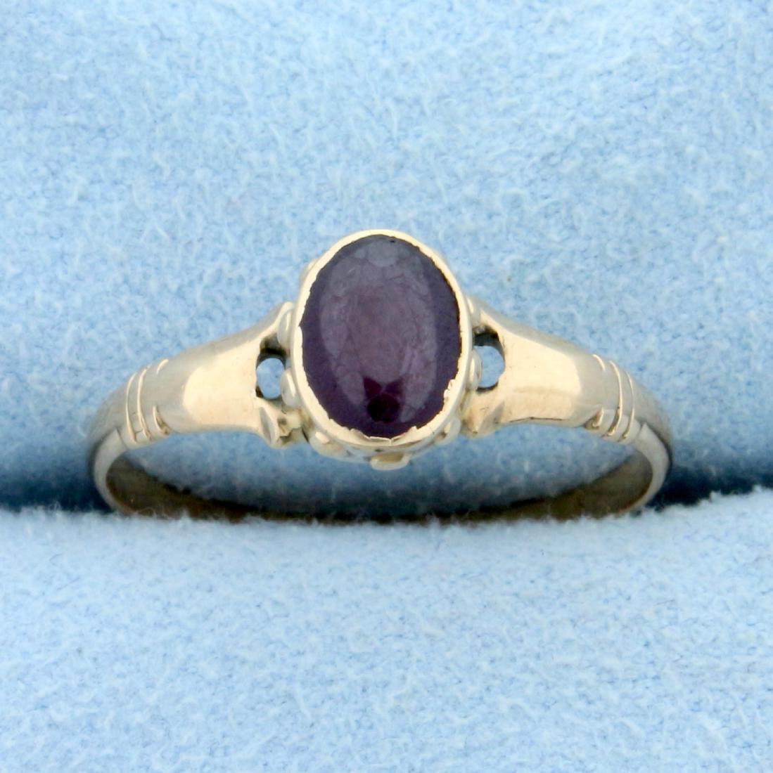 Antique 3/4ct Solitaire Oval Amethyst Ring in 14K: In 14K Yellow Gold with Rose Undertone. Contains one high quality 5x7mm Amethyst gemstone with deep purple color. Size 8. 1.4g.