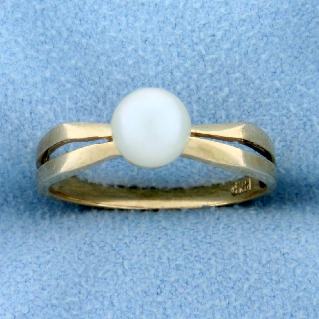 Solitaire Cultured Akoya Pearl Ring in 14k Gold: In 14k yellow gold. Contains a 6mm Cultured Akoya pearl with great color and luster. Size 6 1/2. 2.2g.