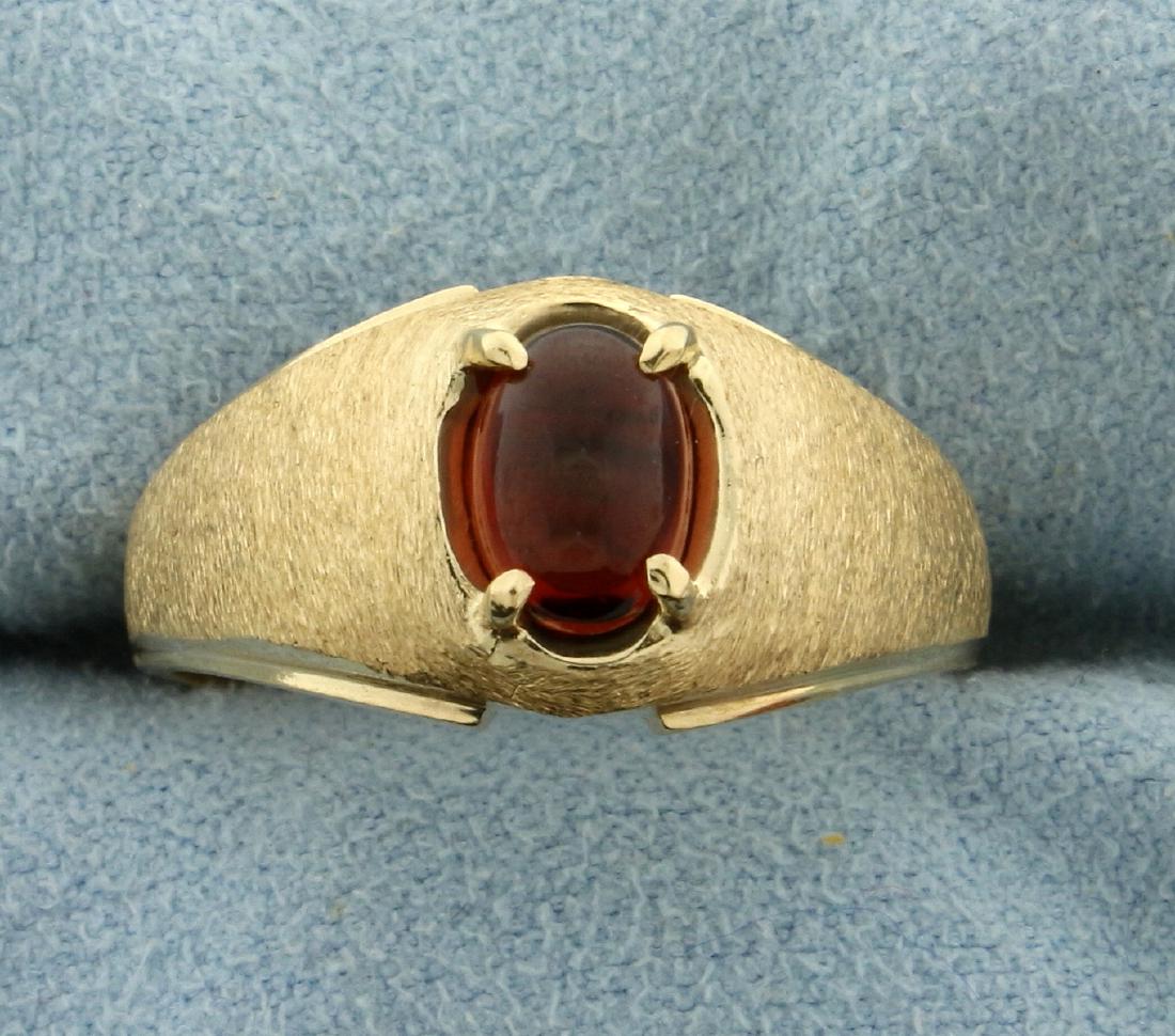 1ct Garnet Ring in 10K Yellow Gold: In 10K Yellow Gold. Contains a high quality natural 7x5mm Garnet gemstone with beautiful red orange color and excellent clarity. Size 9. 4.2g