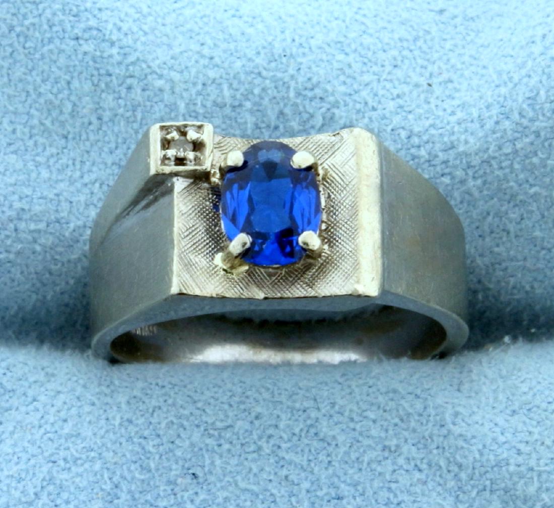 1ct Blue Spinel and Diamond Ring in 10K White Gold: In 10K White Gold. Contains a high quality 7x5mm oval cut Spinel gemstone with bright blue color and excellent clarity. Also contains a high quality .01ct Diamond. Size 8. 5.0g