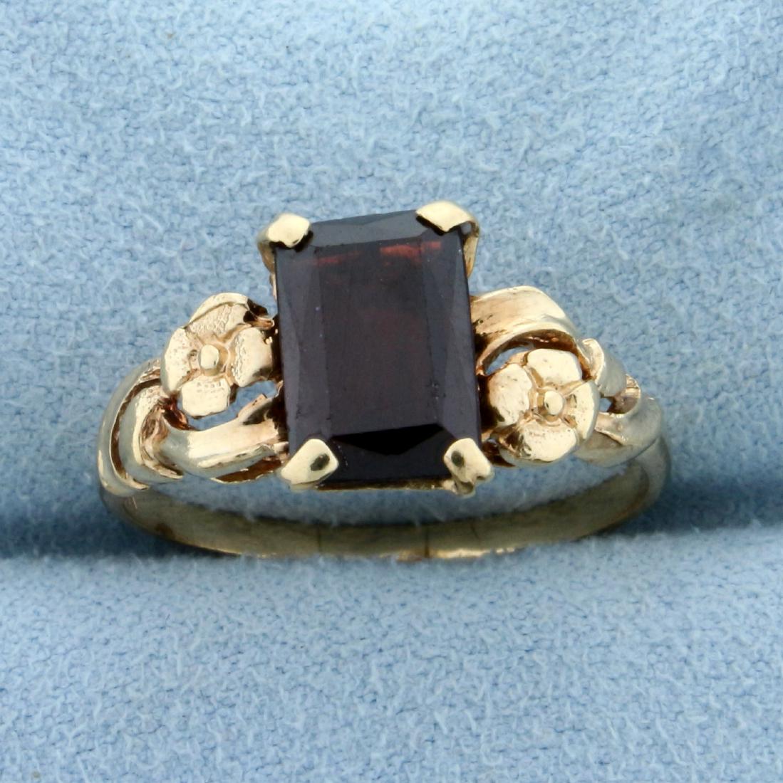Vintage 3ct Garnet Ring in 10K Yellow Gold: In 10K Yellow Gold. Contains one high quality natural 10x7mm emerald cut Garnet gemstone with beautiful red color and excellent clarity. Size 6 1/2. 2.8g