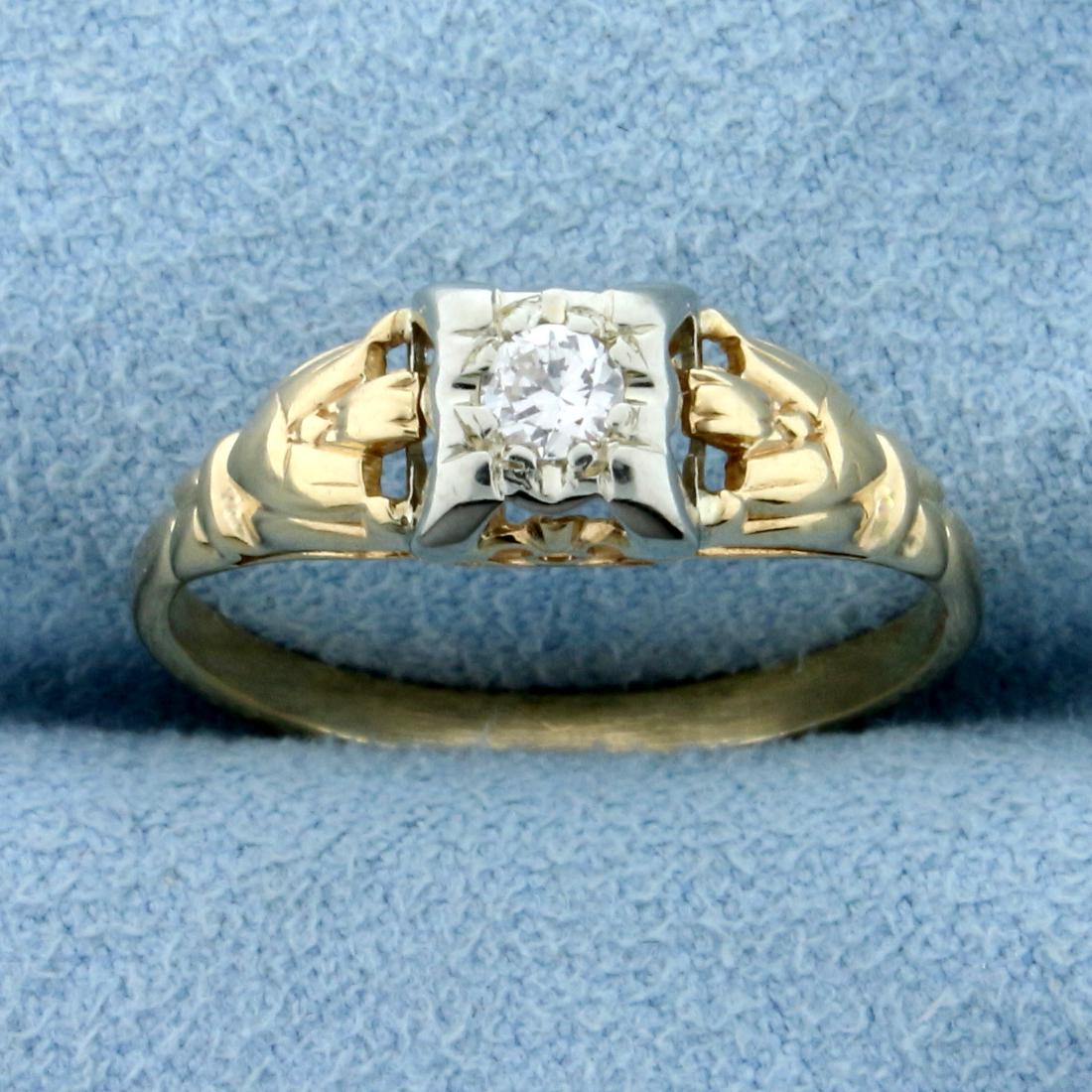 Edwardian .15ct Diamond Solitaire Ring in 14K Yellow: In 14K Yellow and White Gold. Contains one high quality .15ct Old European cut Diamond, VS clarity/ I color. Size 6. 1.6g.