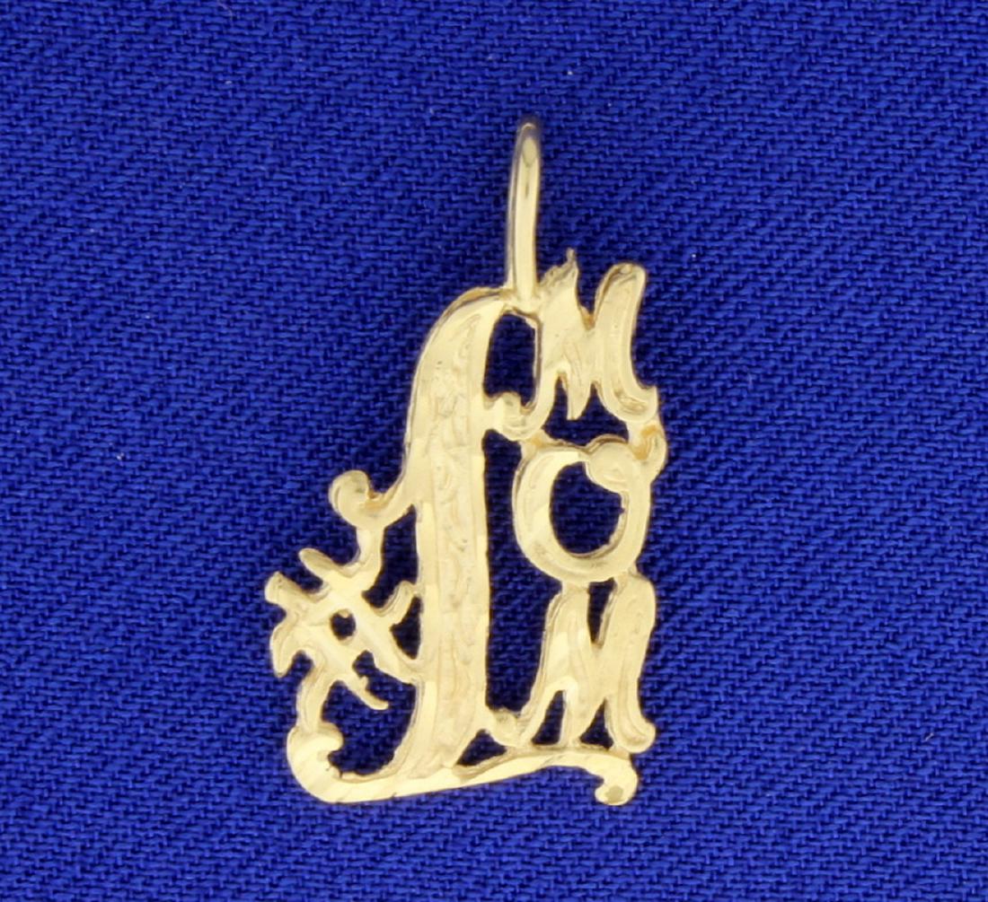 #1 Mom Pendant in 14k Yellow Gold: 14K yellow gold, it is 1 inch long with bale. 1.3g