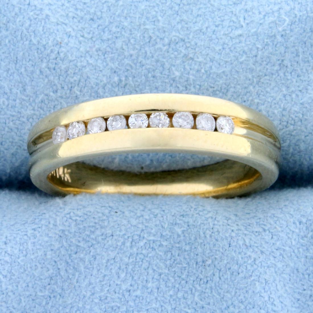 Diamond Wedding or Anniversary Band Ring in 14K Yellow: In 14K Yellow Gold. Contains nine high quality .02ct Diamonds, H color/I1 clarity. Size 8 3/4. 5.9g