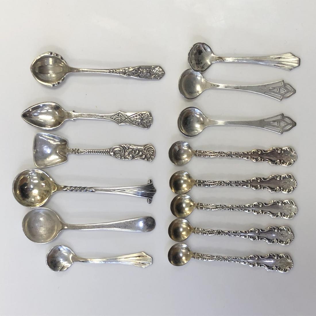 Set of 14 Vintage and Antique Sterling Silver Salt: In Sterling Silver. Sizes range from 2-2 1/2 inches. 39.8g.