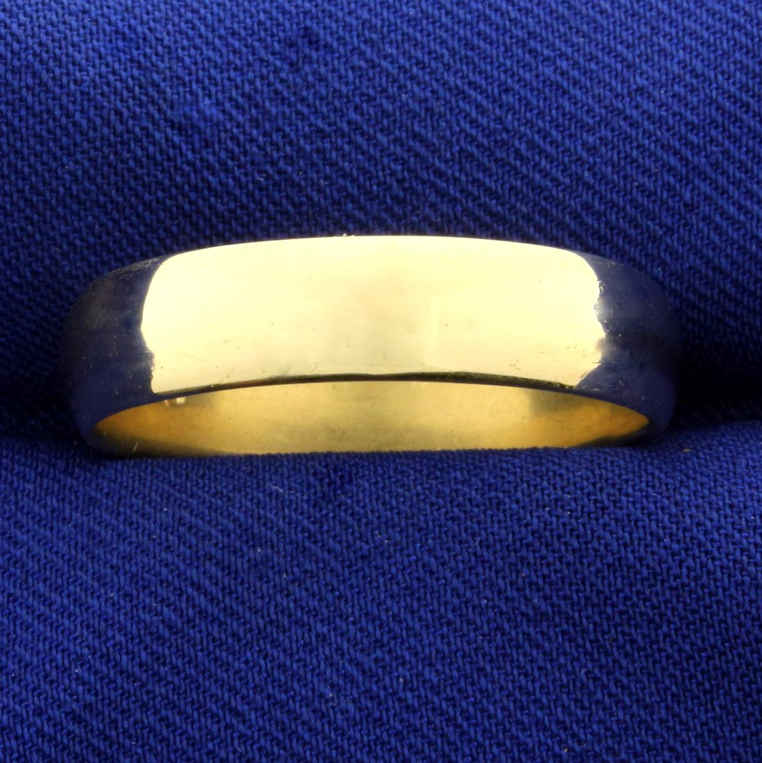 Men's Gold Wedding Band Ring in 14K Yellow Gold: In 14K Yellow Gold. 6mm wide. Size 13 3/4. 8.0g