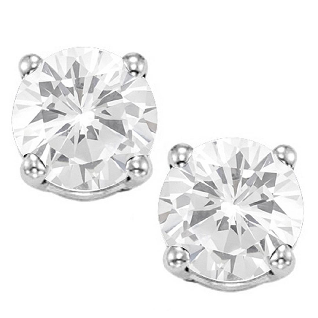 8MM Large White Topaz Stud Earrings in Sterling Silver: Set in platinum over .925 sterling silver, 4-prong basket mountings with friction backs. Contains 2-8mm round cut White Topaz gemstones with excellent clarity and clear ice color. 2.3g