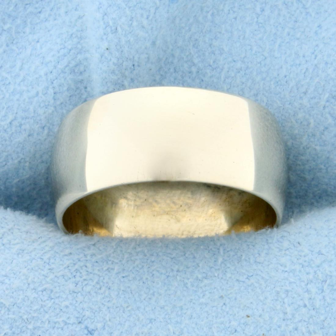 Wide Wedding Band Ring in 10K Yellow Gold: In 10K Yellow Gold. 8mm wide. High polish finish. Size 7. 4.6g.