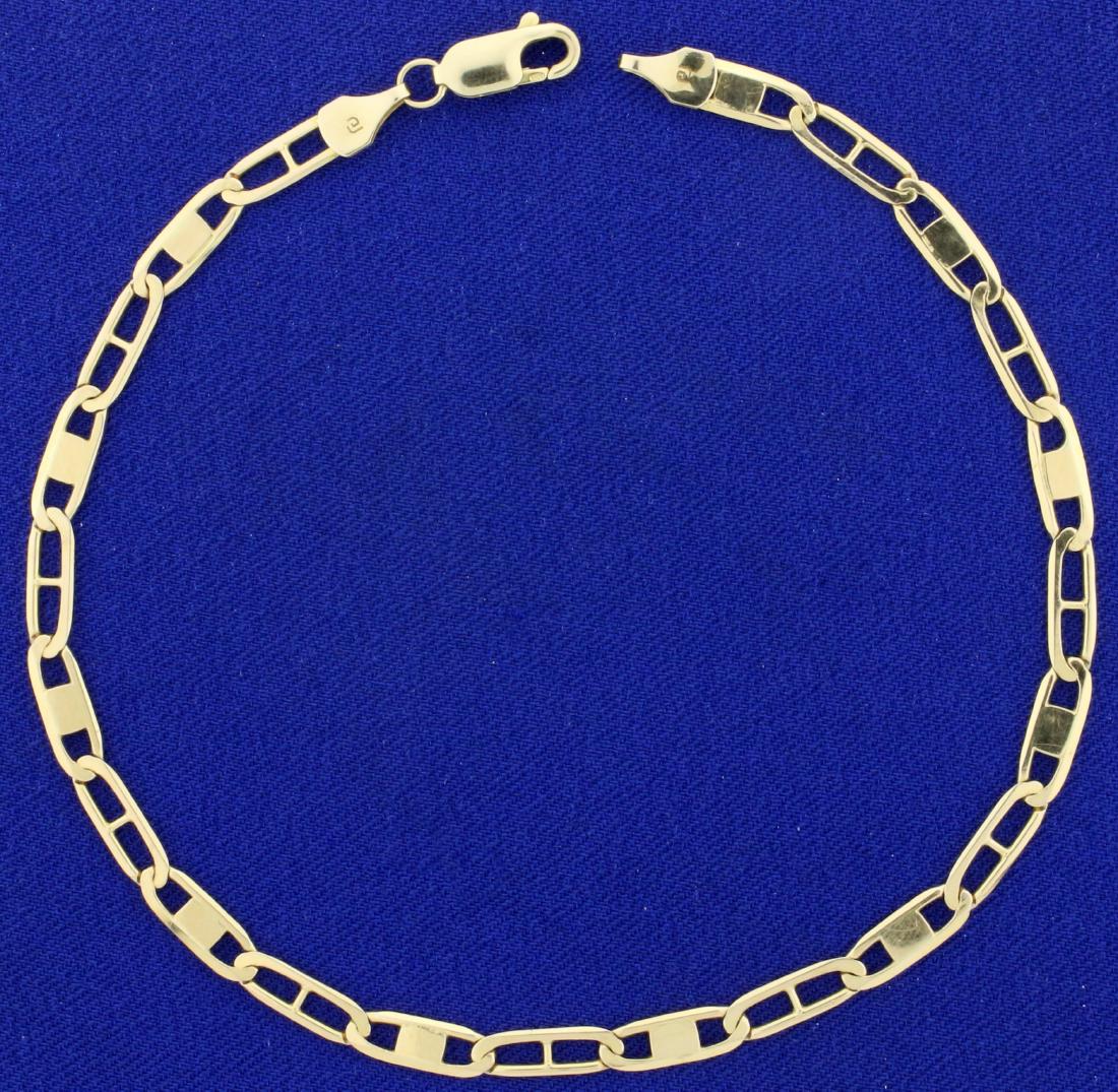 9 1/2 Inch Italian-Made Anchor/Mariner Link Anklet or: In 14K Yellow Gold. 9 1/2 inches long, 4mm wide.