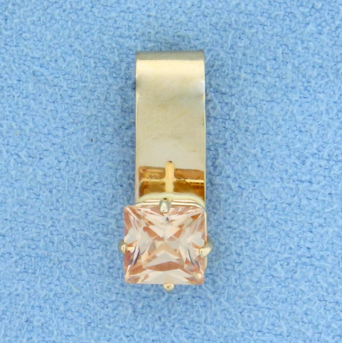 1ct Natural Morganite Pendant or Slide in 14K Yellow: In 14K Yellow Gold. 3/4 inch long. Contains a high quality 6mm natural princess cut Morganite gemstone with beautiful vibrant pink salmon color and excellent clarity. 1.3g.