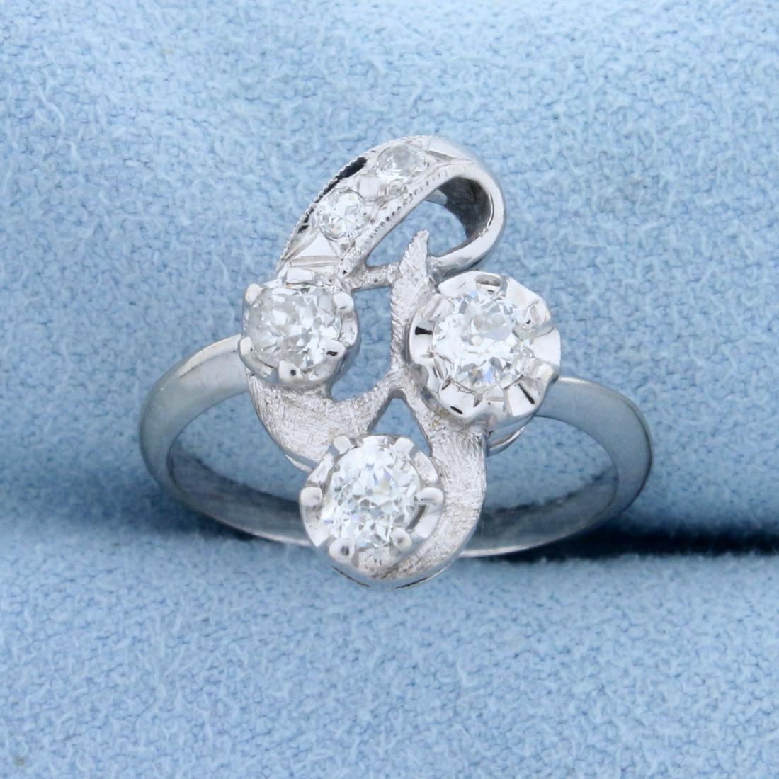 Antique 1/2ct TW Old European Cut Diamond Ring in 14K: In 14K White Gold. Contains five high quality Old European cut Diamonds: two .16ct, one .12ct, and two .03cts - all VS clarity/H color. Size 6. 3.3g
