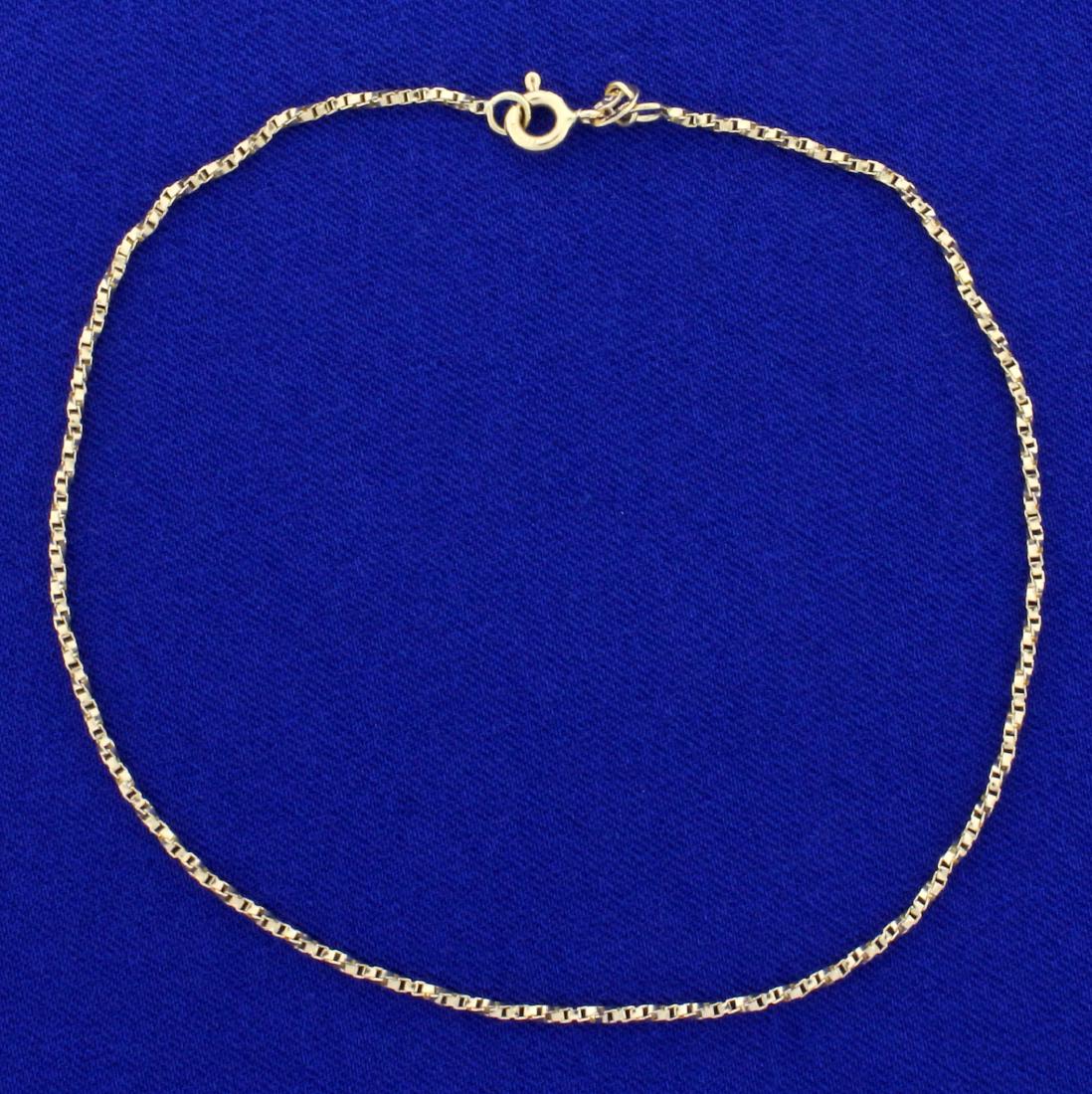 10 Inch Twisting Box Link Anklet in 14K Yellow Gold: In 10K Yellow Gold. 10 inches long, 1.3mm wide. 2.1g.