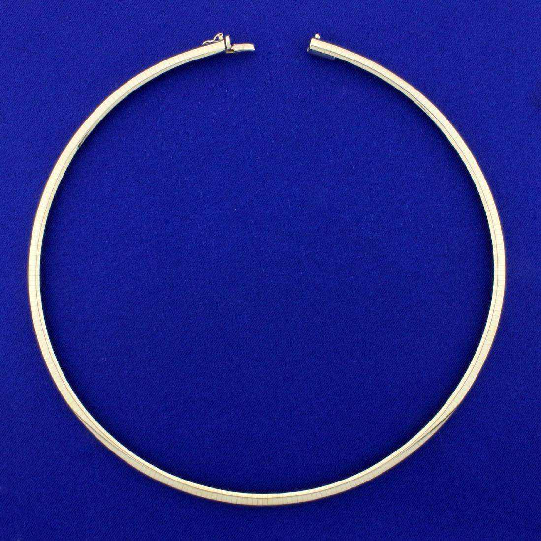 18 inch Italian Made Omega Necklace in 14K Yellow Gold: In 14K Yellow Gold. 5mm wide, 18 inches long. 32.3g