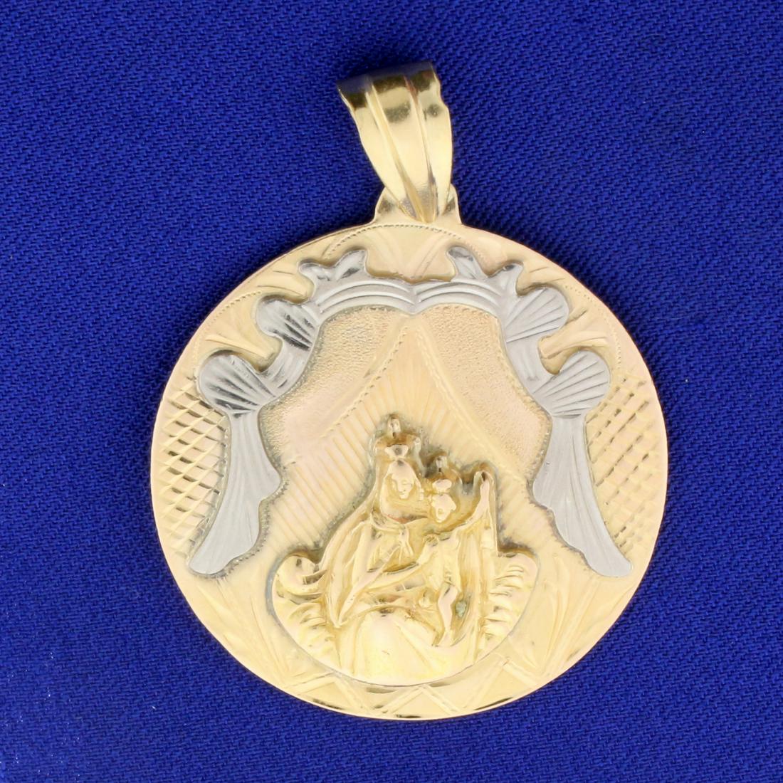 Large Double Sided Miraculous Medal and Blessed Virgin: In 18K Yellow and White Gold. 2 inches long with bale. Catholics believe that wearing the medal with faith and devotion can bring special graces and protection. 21.5g.