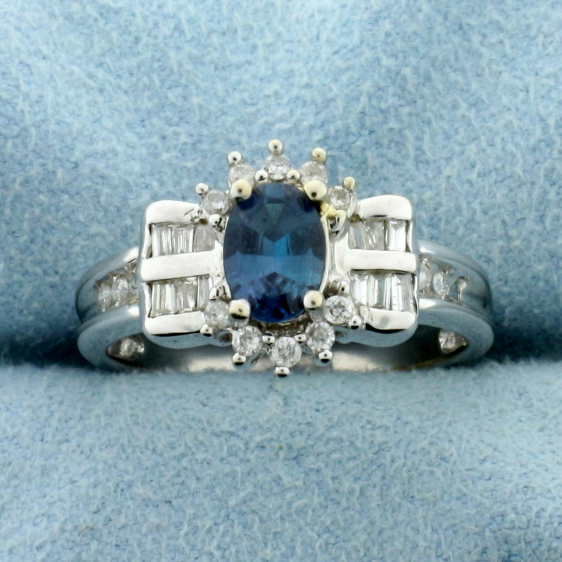 1.25ct TW Alexandrite and Diamond Ring in 14K White: In 14K White Gold. Contains one high quality 1ct oval cut Alexandrite gemstone with dramatic color change from green to purple, depending on lighting conditions, and excellent clarity. Also contains t