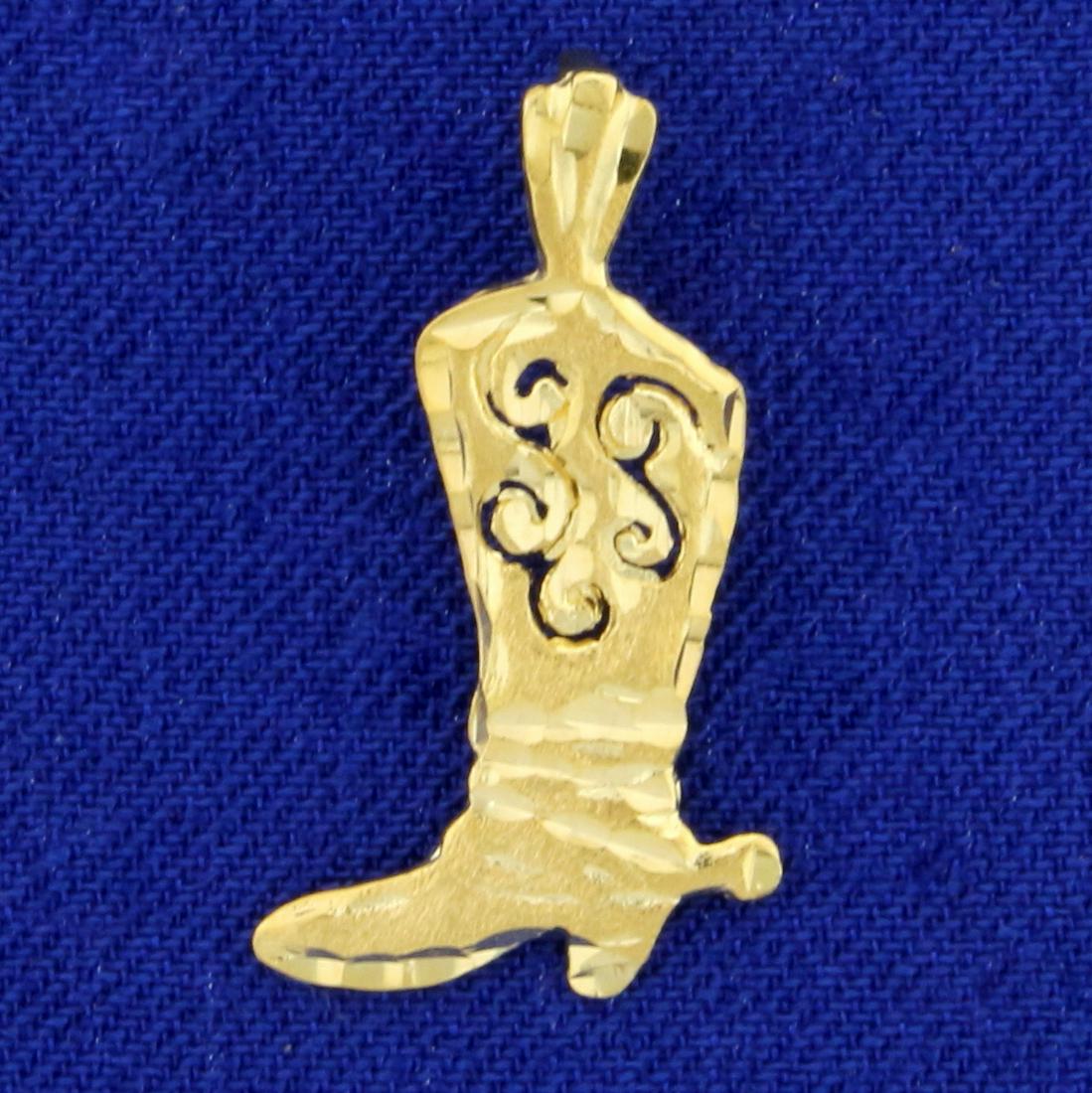 Diamond Cut Cowboy Boot Pendant in 14K Yellow Gold: In 14K Yellow Gold. Diamond Cut for extra sparkle. 1 inch long. 0.9g