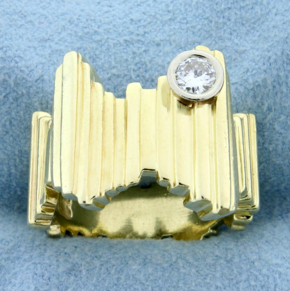 1/4ct Solitaire Modernist Diamond Ring in 18K Yellow: In 18K Yellow Gold. Contains a high quality .25ct round brilliant diamond, VS clarity/G color. Size 7 1/2. 11.8g