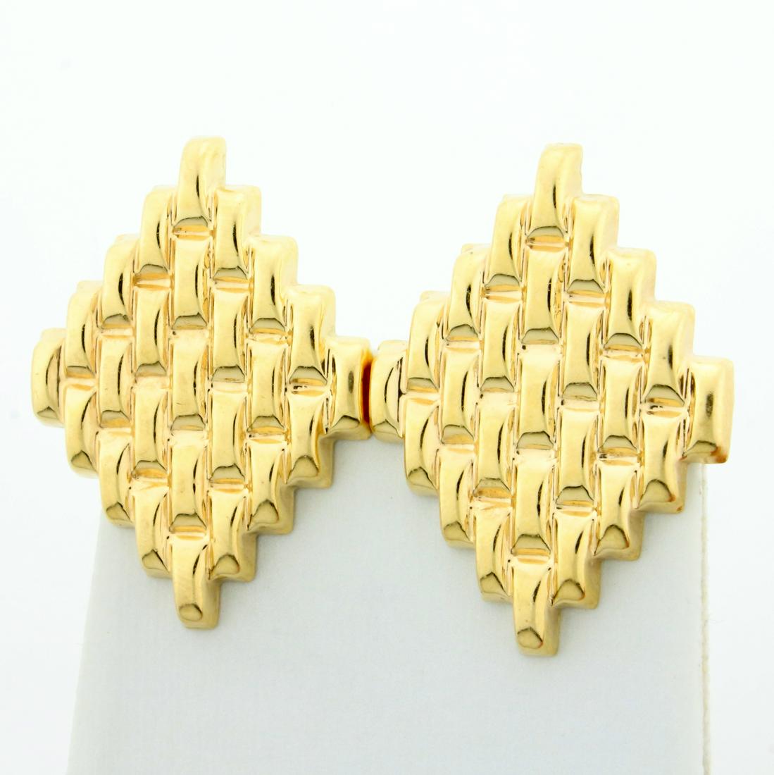 1 1/4 Inch Long Basket Weave Design Earrings in 14K: In 14K Yellow Gold. 1 1/4 inches long and 1 inch wide. With French Omega Backs for Pierced Ears. 7.2g