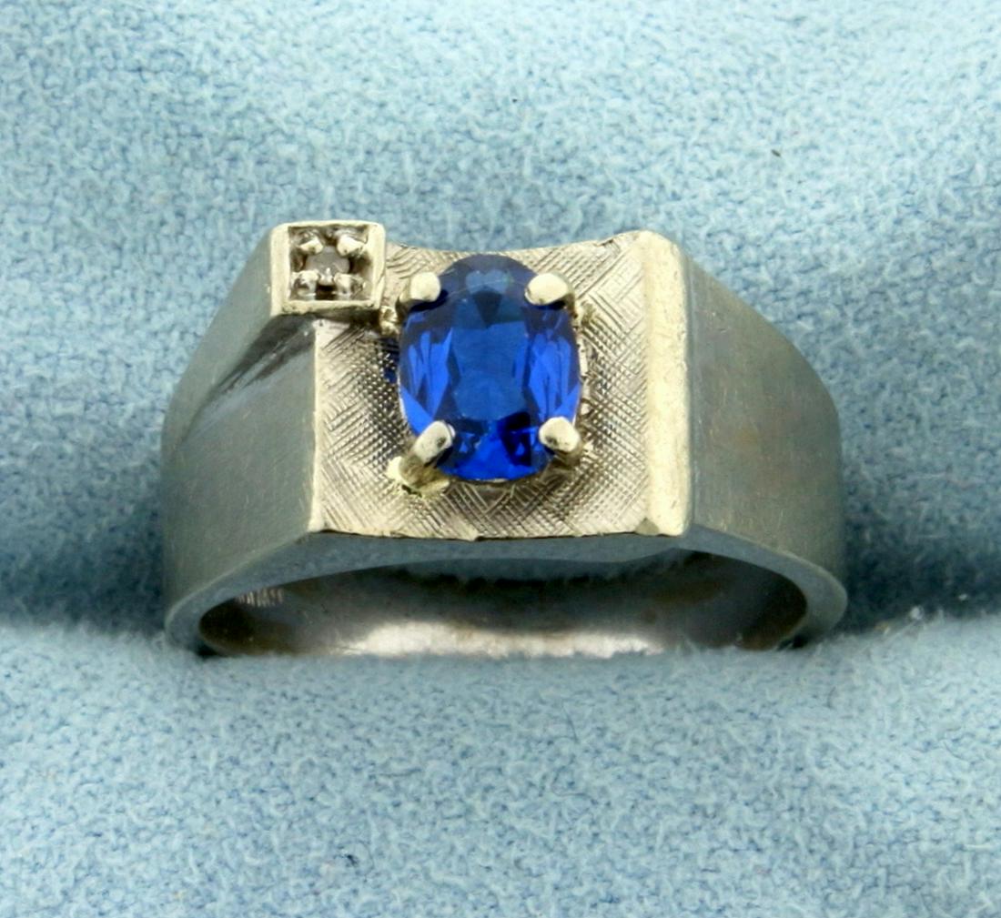1ct Blue Spinel and Diamond Ring in 10K White Gold: In 10K White Gold. Contains a high quality 7x5mm oval cut Spinel gemstone with bright blue color and excellent clarity. Also contains a high quality .01ct Diamond. Size 8. 5.0g