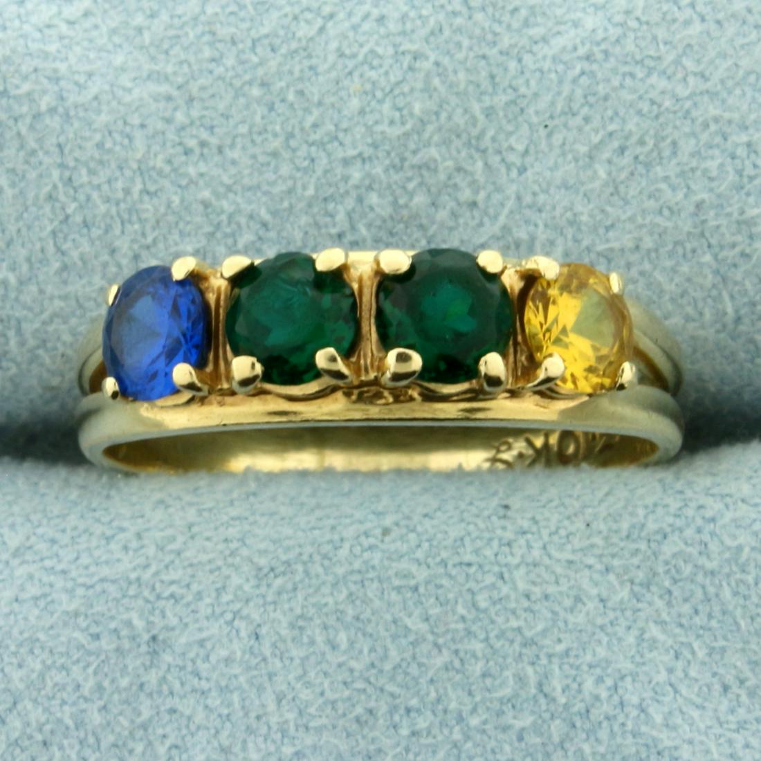 Multi-Colored Spinel Gemstone Ring in 10K Yellow Gold: In 10K Yellow Gold. Contains four natural high quality 4.5mm round spinel gemstones in vibrant colors and excellent clarity. Size 10 1/2. 3.5g