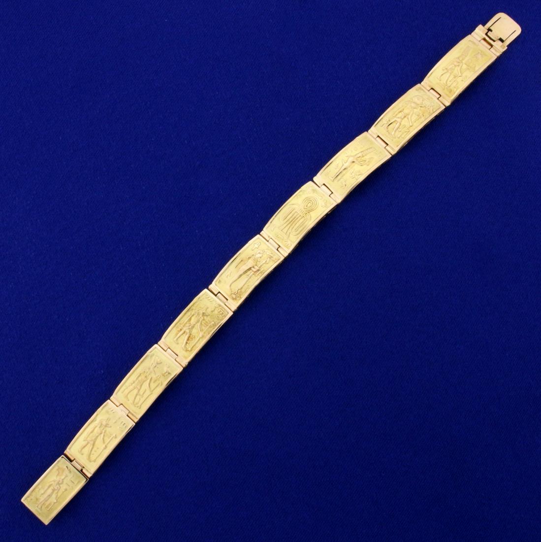 Heavy Ancient Egyptian Gold Link Bracelet in K Yellow: In 18K Yellow Gold. 7 3/4 inches long. 11mm wide. 32.2g