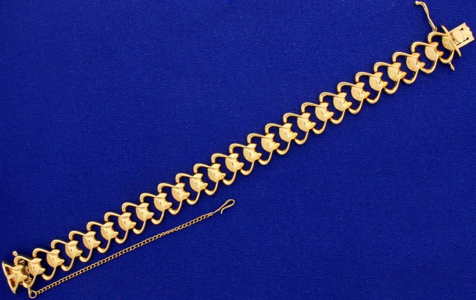 Heavy 18K Rose Gold Designer Link Bracelet: In 18K Rose Gold. 7" long, with safety clasp and chain. 13mm wide. 22.3g